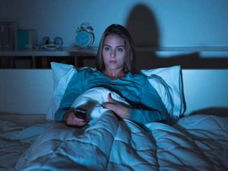 person in bed