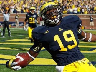 michigan wolverines football player devin funchess scores a touchdown