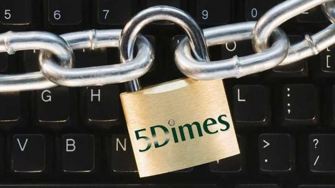 5dimes suspends offshore gambling to enter us market as domestic igaming operator keyboard with 5dimes padlock and chains