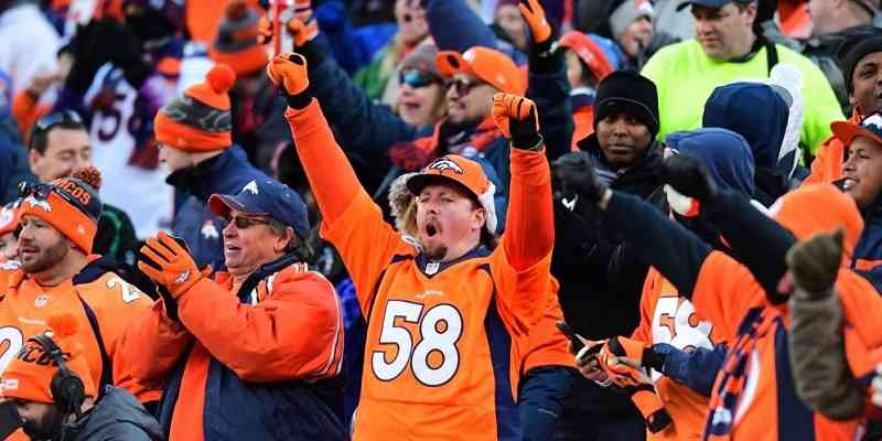 denver broncos fan cheering in nfl crowd